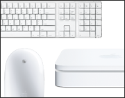 Wireless keyboard and Mighty Mouse. Airport Extreme Base Station.