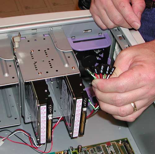 small bundle of wires that connect to certain pins on the motherboard