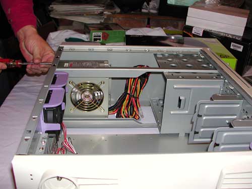 mount the power supply in the case