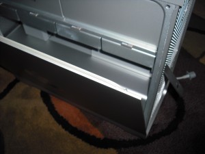 DSCF0002 Tilt the top of the side panel out, then lift the side panel off the computer.