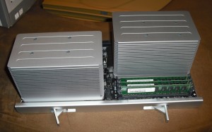 The computer came with 6GB of RAM installed. Three sticks in these slots, and three sticks in the slots behind the second processor (on the left).